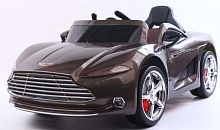 Toyland Электромобиль Aston Martin FLSeat / цвет коричневый					